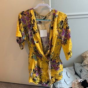 Yellow floral romper size L